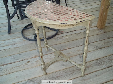 antique table w/ pennies