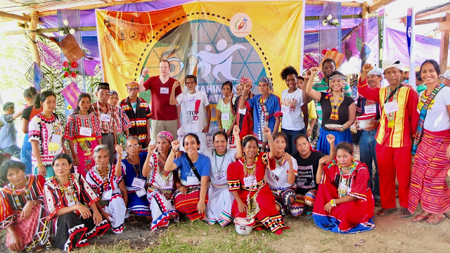 Czarina with Lumads during the “Kahimunan sa Katungod” (Rights Act), a part of the Healing the Hurt Project of the Rural Missionaries of the Philippines Northern Mindanao region (RMP-NMR). Mindanao, 2017