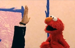 The hand and Elmo count five fingers. Sesame Street Elmo's World Hands Interview