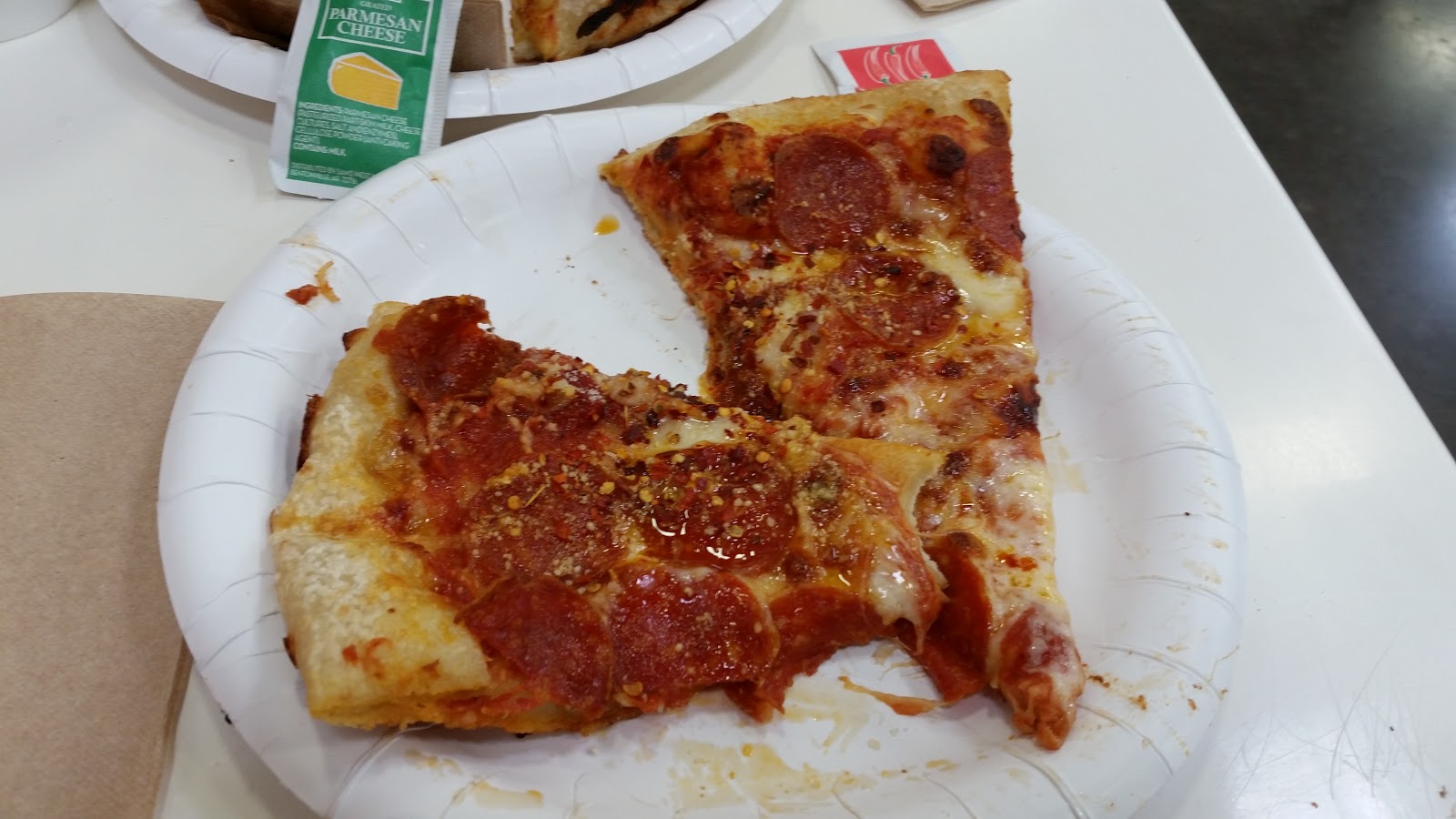 While You Are Dining Pizza by the Slice at Sam's Club!