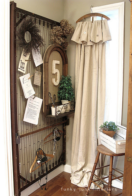 Learn how to make these easy vintage hanger crop cloth curtains as a window treatment with a drop cloth and vintage hanger! Click for the full tutorial.