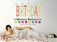 monica bellucci birthday, hot white long dress picture in lying position on floor