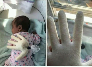 mother plays prank on her baby with glove filled with rice