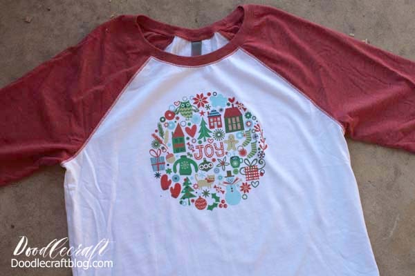 Make a festive holiday joy shirt with Cricut iron-on designs in just a couple minutes! This cute shirt is perfect for a Christmas party or as a holiday gift.