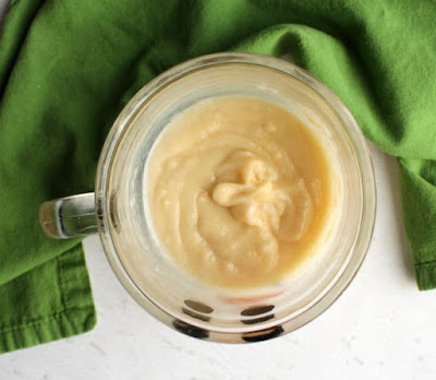 peppermint mug cake batter in glass mug