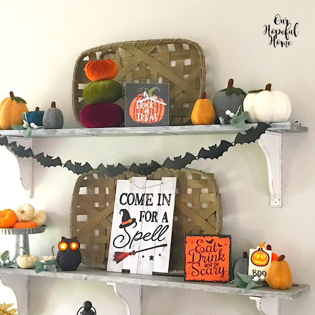 floating farmhouse shelves Halloween decor pumpkins signs owls bats
