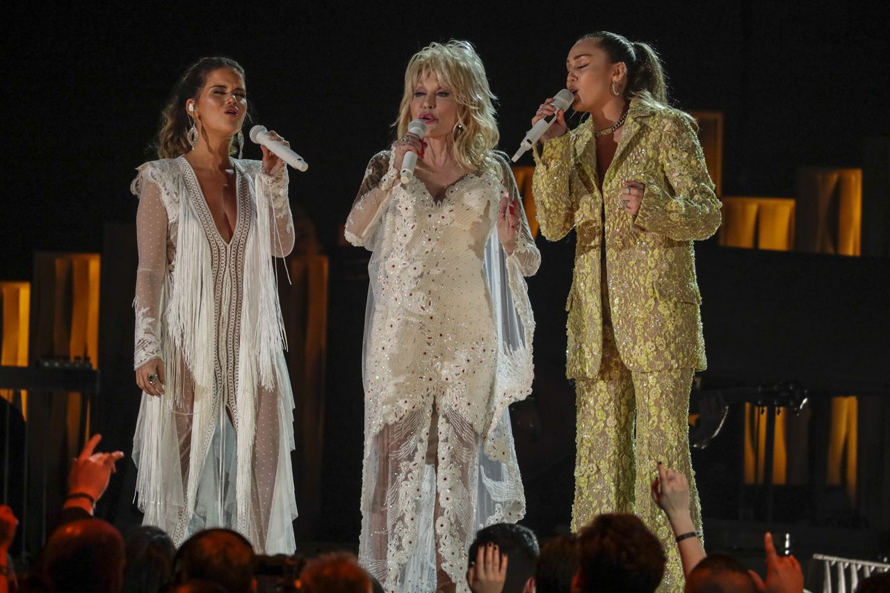 Dolly Parton and Miley Cyrus Perform During the 61st Grammy Awards