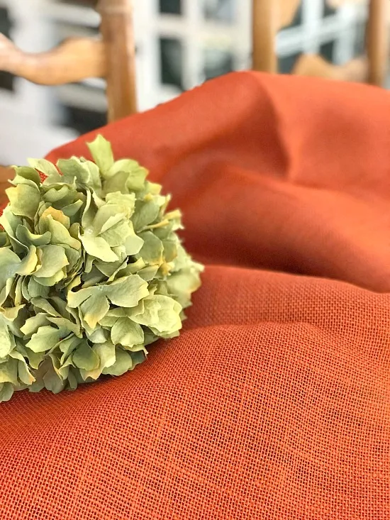 Orange burlap and a hydrangea