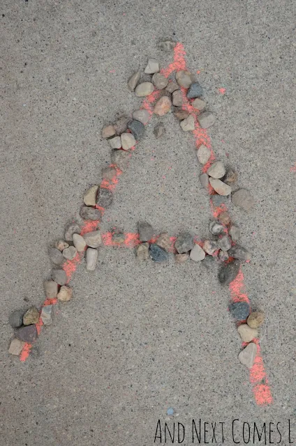 Sidewalk chalk & rock letters