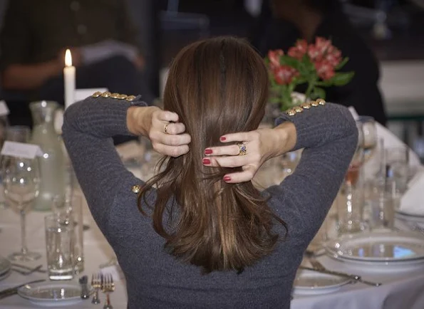 Princess Marie at DanChurchAid Christmas celebrations, wore pink coat, grey pumps, diamond ring and earrings