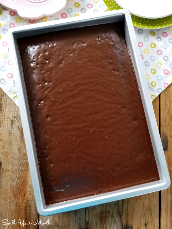 The BEST chocolate Texas sheet cake recipe that's as velvety tender as petit fours and so sinfully addictive you’ll call it the devil!