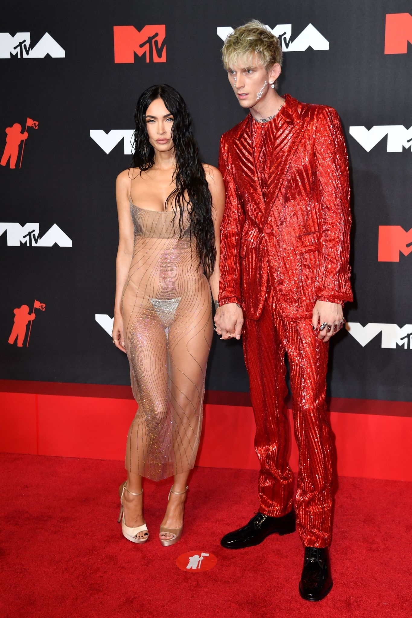 Megan Fox in bold see-through dress for 2021 MTV VMAs with Machine Gun Kelly