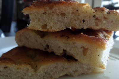 Focaccia (sourdough):  A flat bread made from a very wet dough and flavored with herb olive oil.