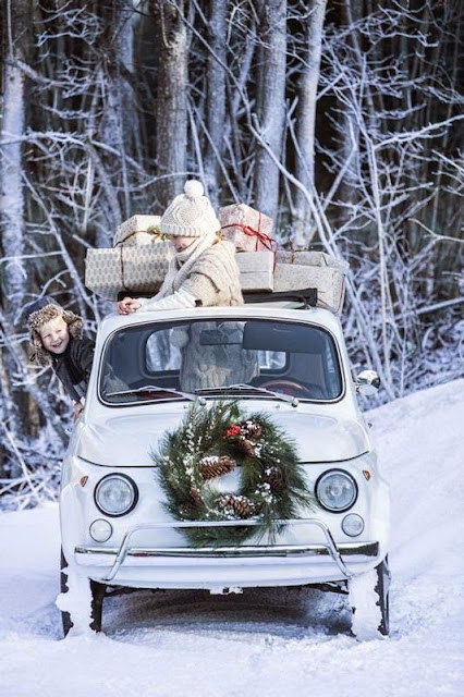 kids with vintage car christmas wreath snow woods presents on top