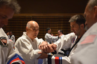 Grandmaster Bong Yul Shin teaching self defense to Moo Sul Kwan black belts Grandmaster Bong Yul Shin teaching self defense to Moo Sul Kwan black belts