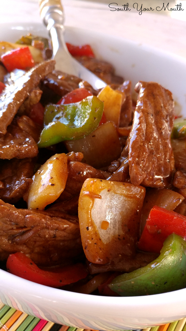 Pepper Steak! Super easy recipe with sauteed steak strips, peppers and onions. PERFECT over rice! 