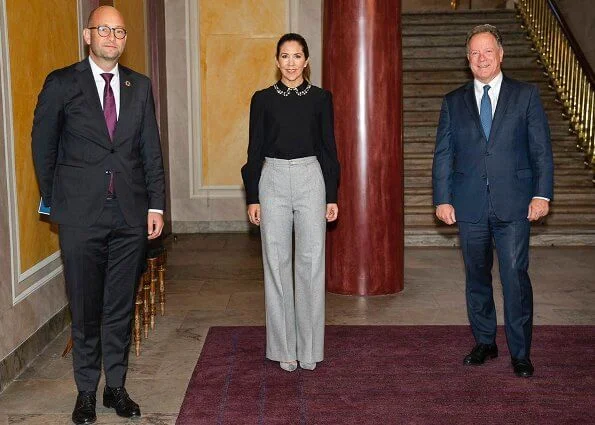 Crown Princess Mary wore a new crystal-collar crepe top from Red Valentino. Minister for Development Aid Rasmus Prehn.  UN World Food Programme