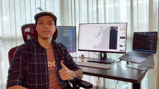 Gif of student in google Noogler hat, with fan spinning