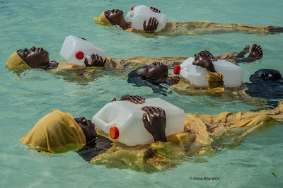 © Anna Boyiazis: Kijini Primary School students learn to float, swim and perform rescues in the Indian Ocean off of Muyuni, Zanzibar, 2016 © Anna Boyiazis color photograph of young women learning to swim in  Indian Ocean off of Muyuni, Zanzibar