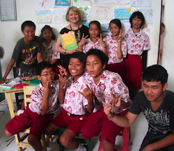 Sharing THE  POETRY FRIDAY ANTHOLOGY with kids in Bali!