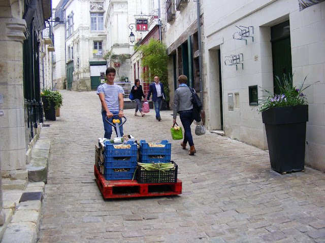 Hauling fresh produce from the market to a restaurant, Loches, Indre et Loire, France. Photo by Loire Valley Time Travel.