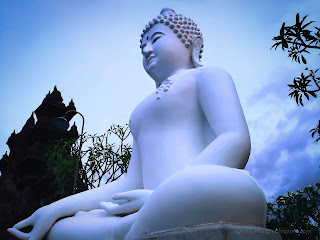 Down Side View Varada Mudra Big White Buddha Statues At Buddhist Temple, North Bali, Indonesia