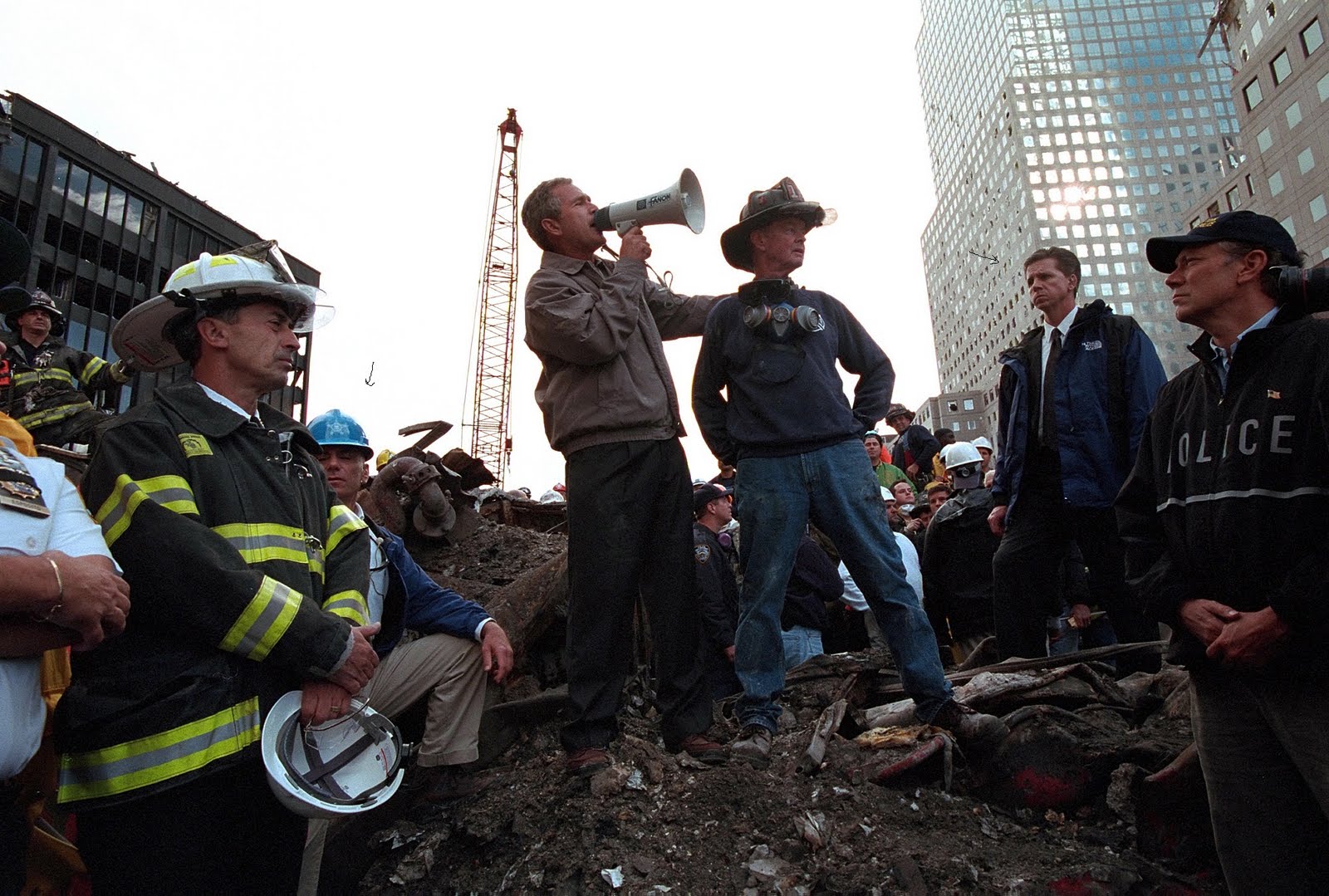ASAIC Al Concordia (light blue helmet) & SAIC Carl Truscott with President Bush at Ground Zero