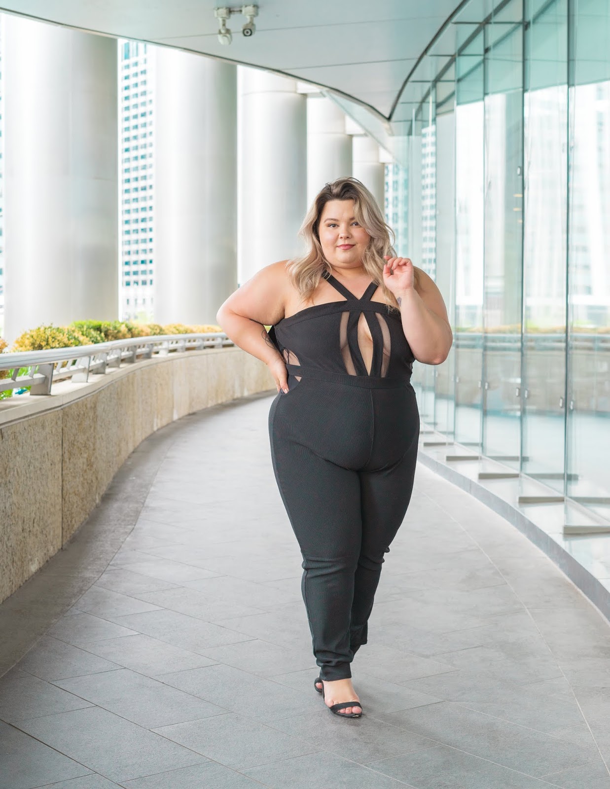 Chicago Plus Size Petite Fashion Blogger, YouTuber, and model Natalie Craig, of Natalie in the City, review's Fashion Nova's jumpsuits.