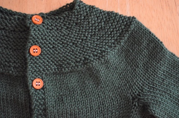 green baby sweater