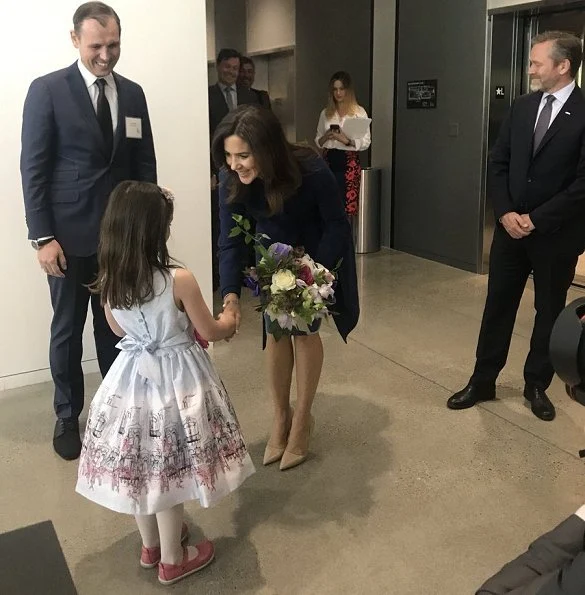 Crown Princess Mary wore Prada nude pointed toe pump, carried Prada Saffiano Cuir Double Bag, By Malene Birger blue belted wool-blend coat and print dress