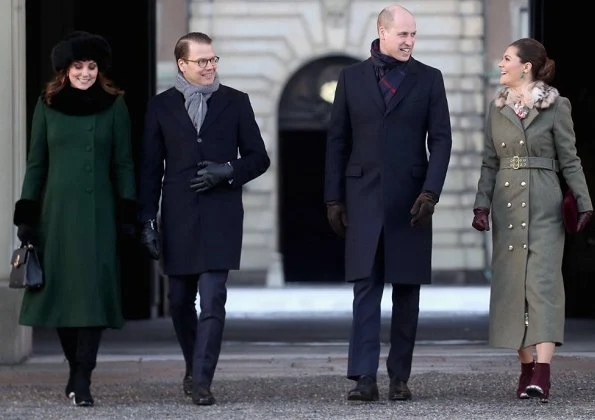 Kate Middleton wore a new bespoke Catherine Walker coat and dress. Duchess accessorised her coat with a faux fur collar and faux fur cuffs from Troy London