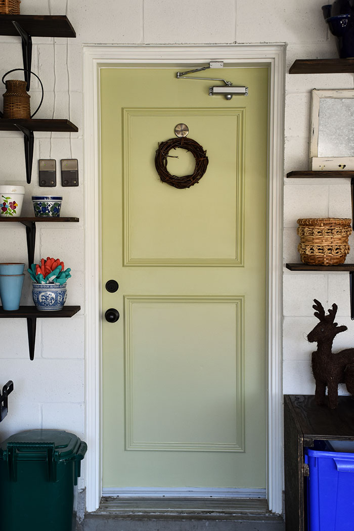 Woman in Real Life Garage Entry Door Paint and Trim Makeover & Garage