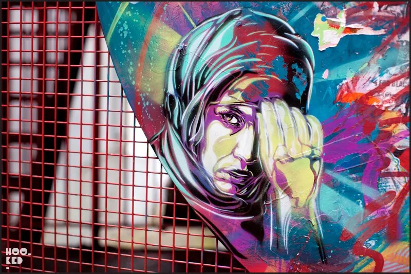 London street art portrait of a women in a headscarf by artist C215