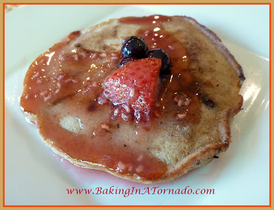 Hazelnut Coffee Pancakes with Berry Syrup | recipe developed by www.BakingInATornado.com | #recipe #breakfast