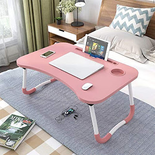 Laptop stand which is portable which can work by keeping it on the sofa or your bed