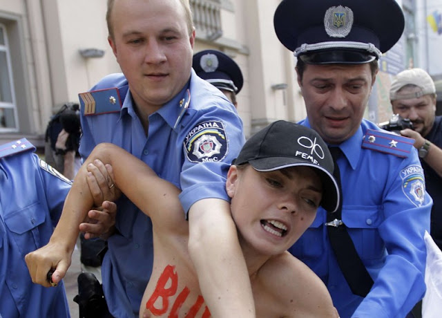 TOPLESS FEMEN FOUNDER FOUND "TITS UP" AFTER TOPPING HERSELF