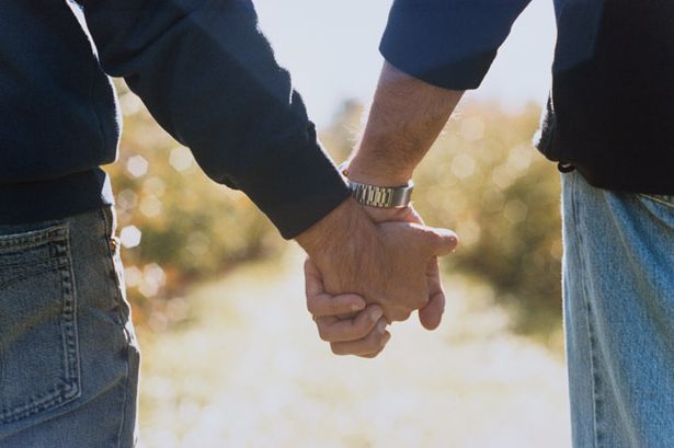 Gay Men Holding Hands 100