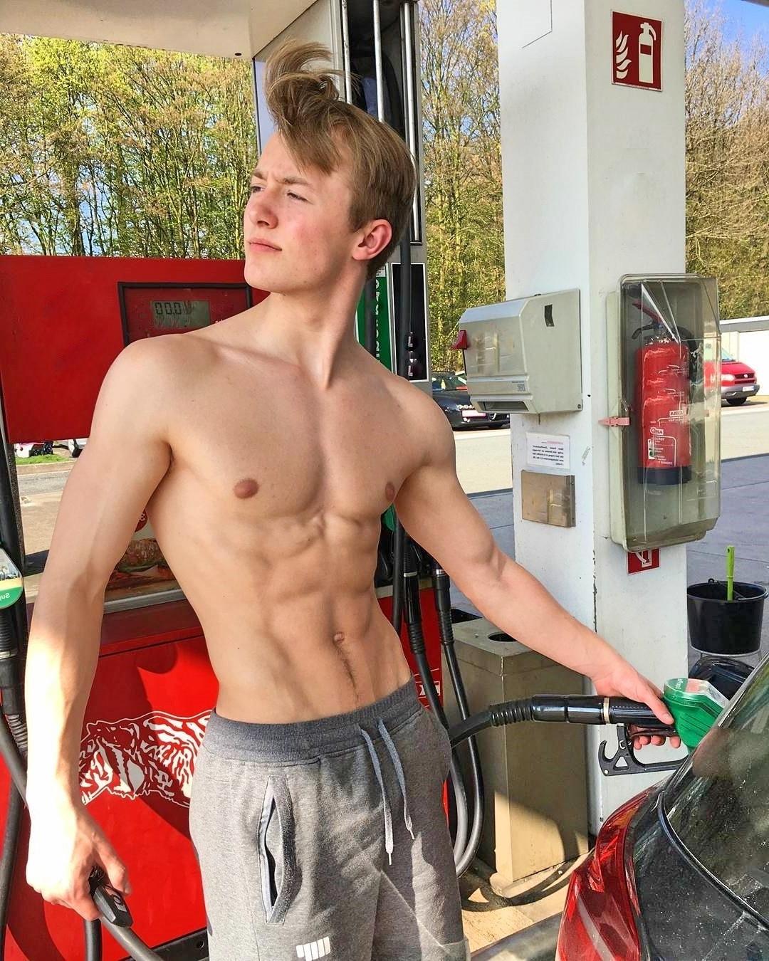 hot-young-college-boy-working-gas-statio