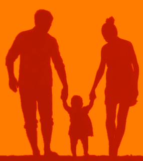 Silhouette of parents with child