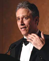 JON STEWART (1962-PRESENT) COMEDIC ENTERTAINER - POLITICAL COMMENTATOR