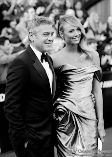 George Clooney and Stacy Kleiber over red carpet at 2012 Academy Awards - Oscar arrival