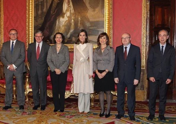 Queen Letizia carried Carolina Herrera Authenticity Card Camelot Collection Handbag and she wore Carolina Herrera wool and cashmere coat