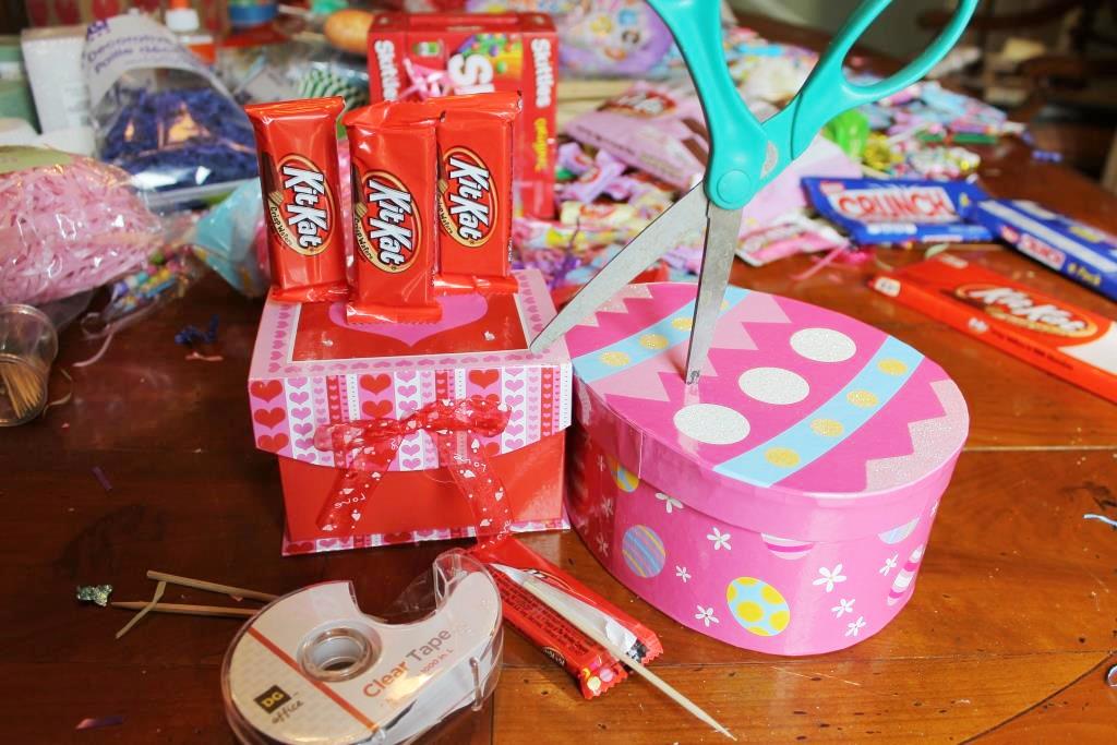 DIY candy bouquet. use wooden bbq skewers and large and small candy bars  taped together. buy a vase from the…