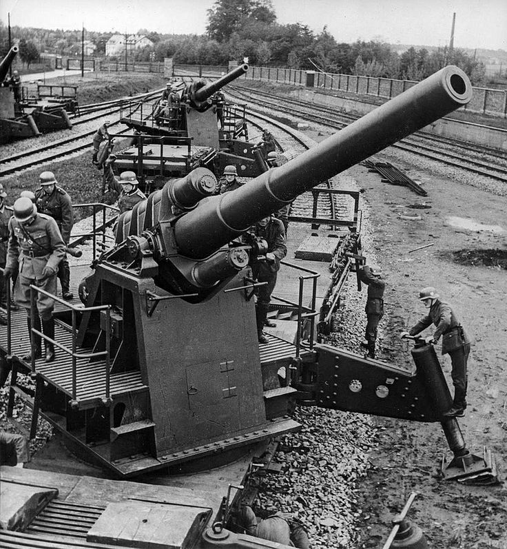 World War II History German artillery 150 mm rail guns getting ready to open fire at the
