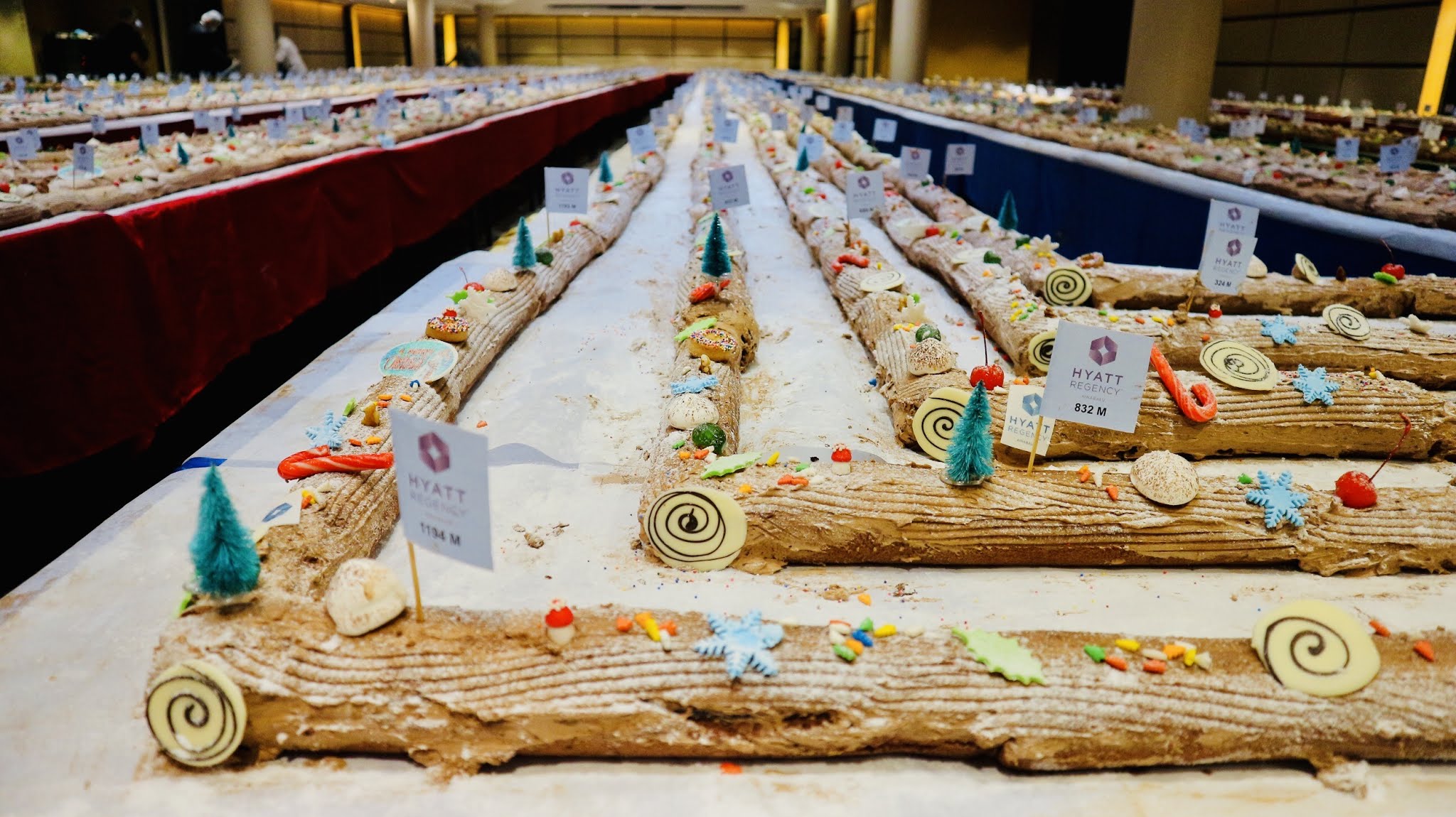 HYATT REGENCY KINABALU RECORD BREAKING ATTEMPT FOR WORLD'S LONGEST YULE LOG CAKE HYATT REGENCY KINABALU RECORD BREAKING ATTEMPT FOR WORLD'S LONGEST YULE LOG CAKE