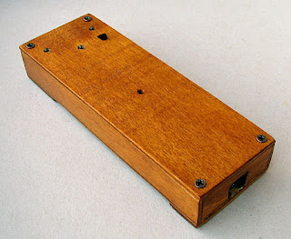Fig. 10th The back of the phone with LED switch and a hole for the bell