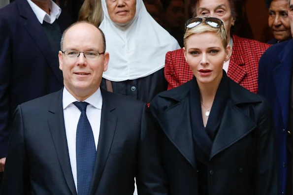 Prince Albert II of Monaco and Princess Charlene of Monaco attends parcels distribution at the Monaco Red Cross headquarters 