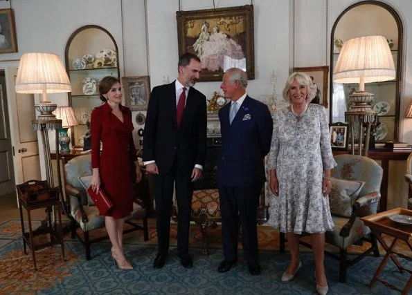 Queen Letizia visited the Palace of Westminster, British Parliament. Prince Charles and Duchess Camilla at Clarence House. Nina Ricci dress. Prada Pumps