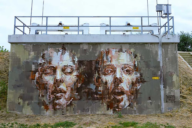 Street Art Mural By Spanish Street Artist Borondo In Cotignola, Italy.