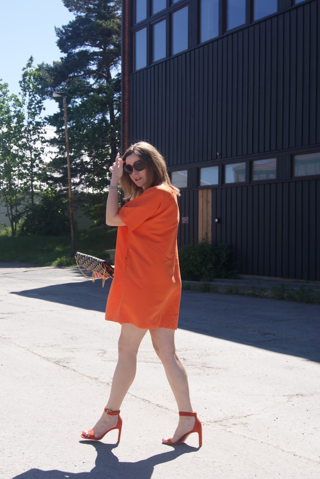 in the style orange dress